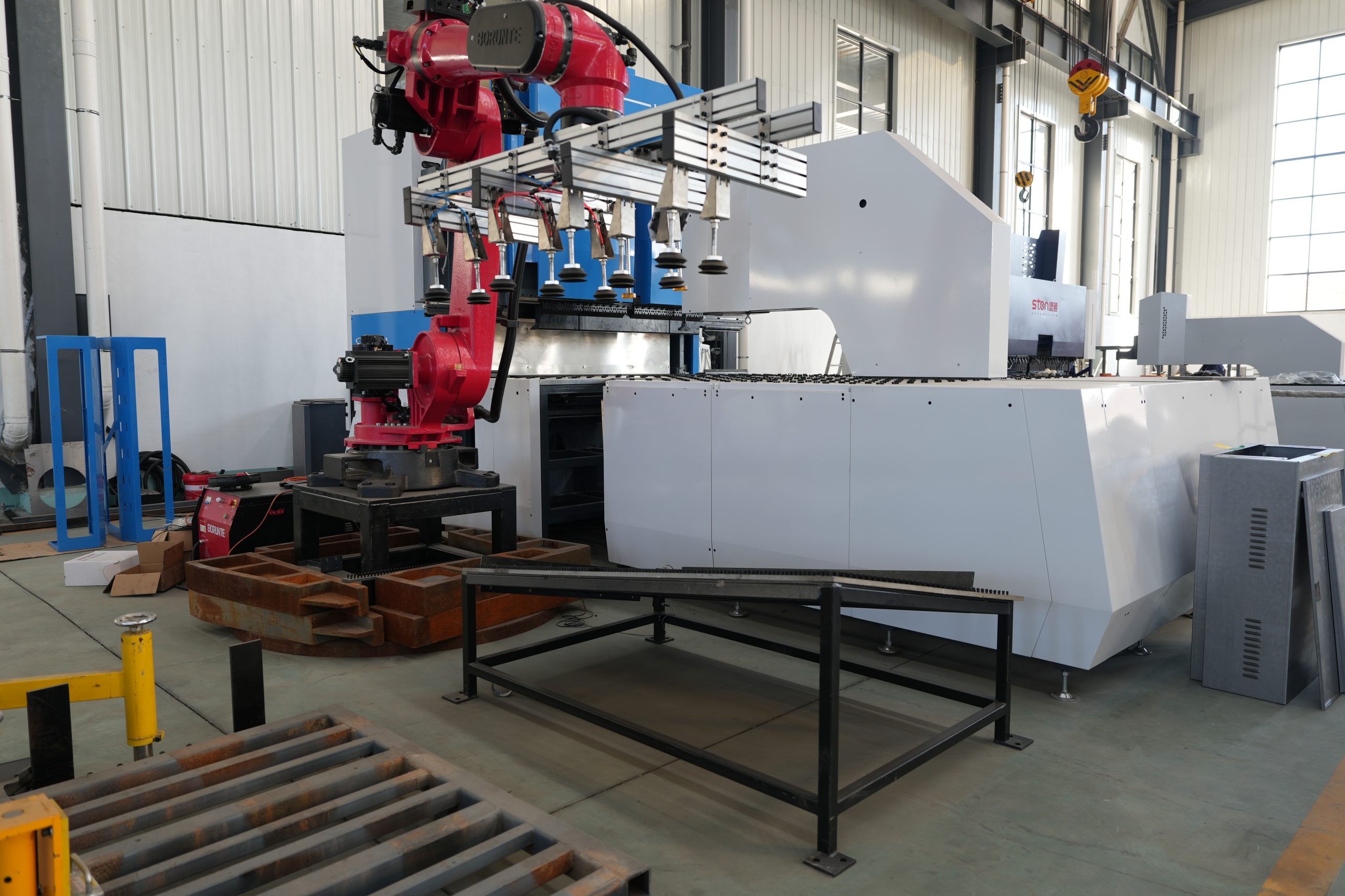 STON panel bending line with stacked cabinet components